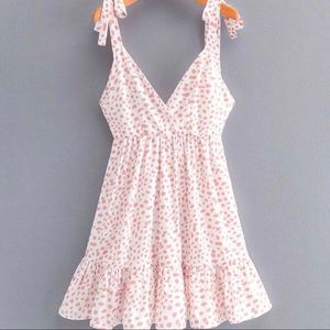 Pink and white dalmatian print dress